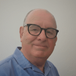 Headshot of Nick Schumann